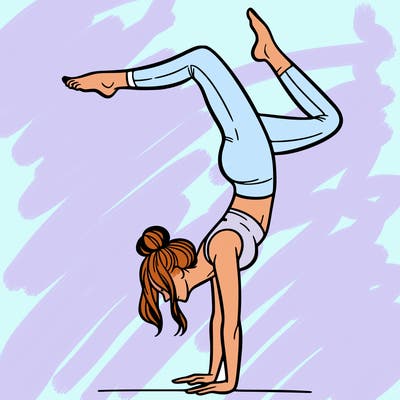 a woman doing a handstand