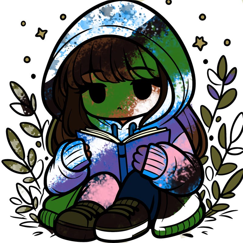 girl in oversized hoodie reading a book