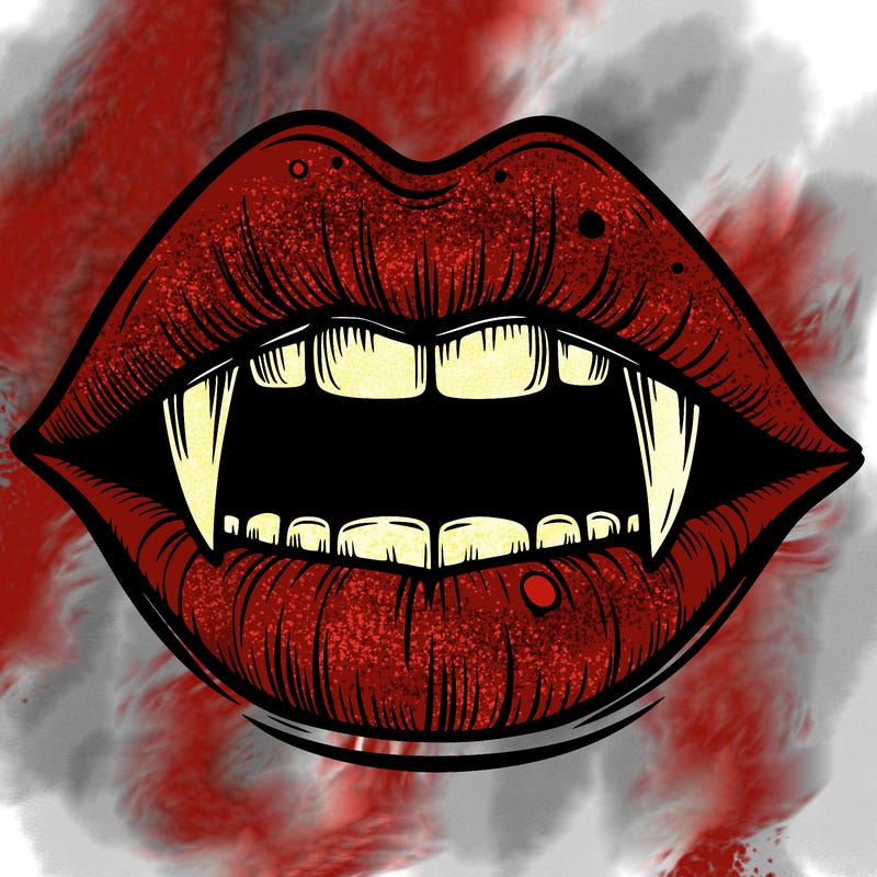 lips with vampire teeth
