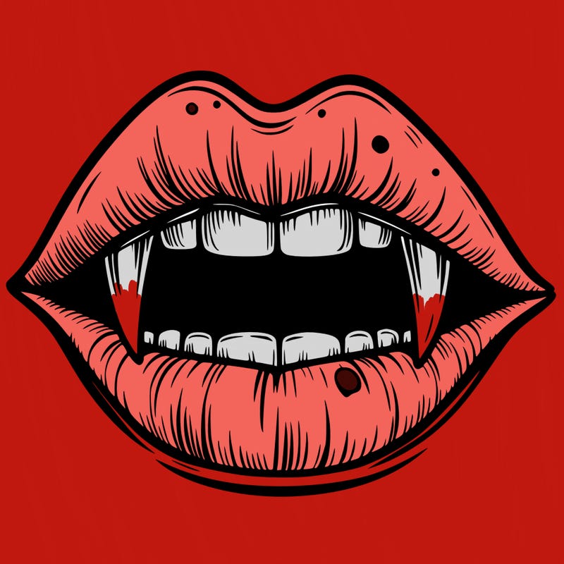 lips with vampire teeth