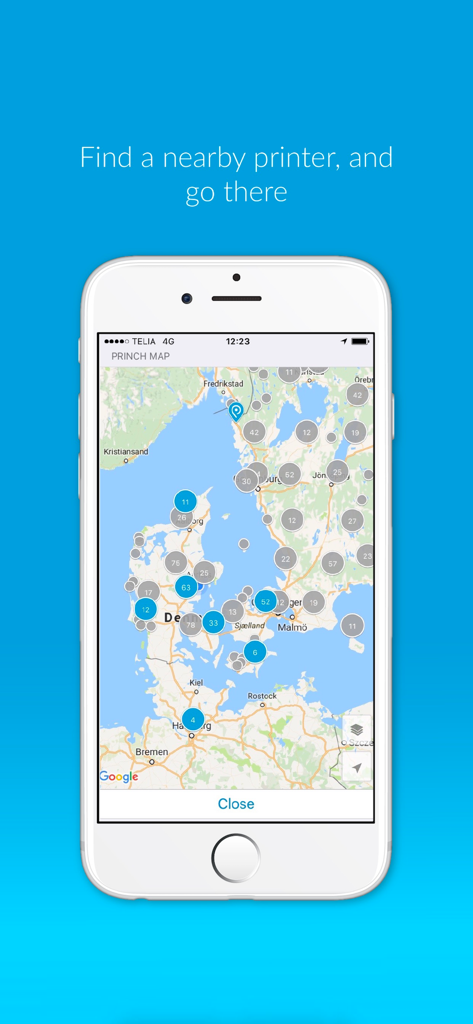 Un écran de téléphone portable affichant la carte de l'application Princh avec plusieurs marqueurs indiquant l'emplacement des imprimantes publiques à proximité.