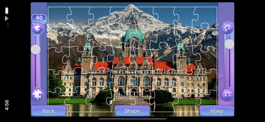 User interface of Everyday Jigsaw showing a customizable puzzle of a historic building and snowy mountains