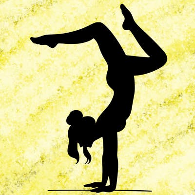 a woman doing a handstand