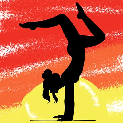 a woman doing a handstand