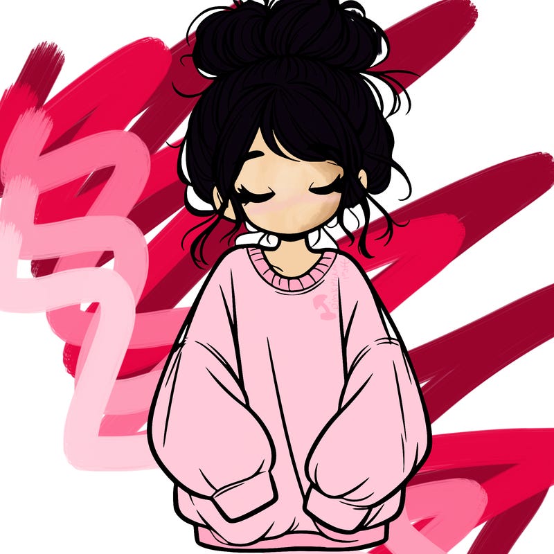 girl with baggy sweatshirt and messy bun