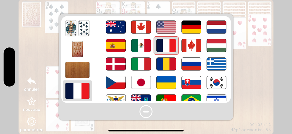 Solitaire - Cards - Pantalla de configuración del juego de Solitario que muestra opciones de temas de banderas nacionales y estilos de baraja de cartas