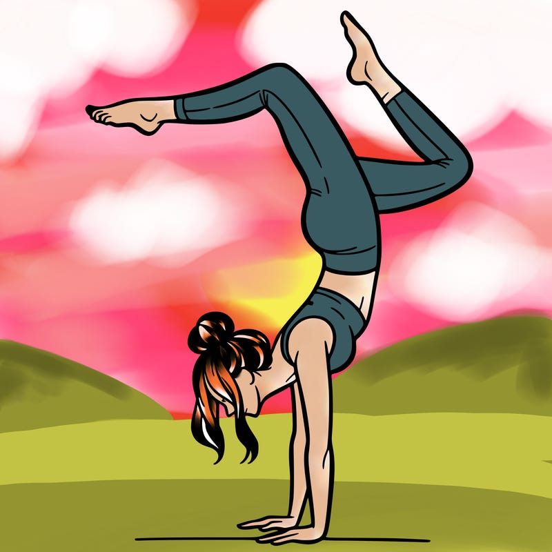 a woman doing a handstand