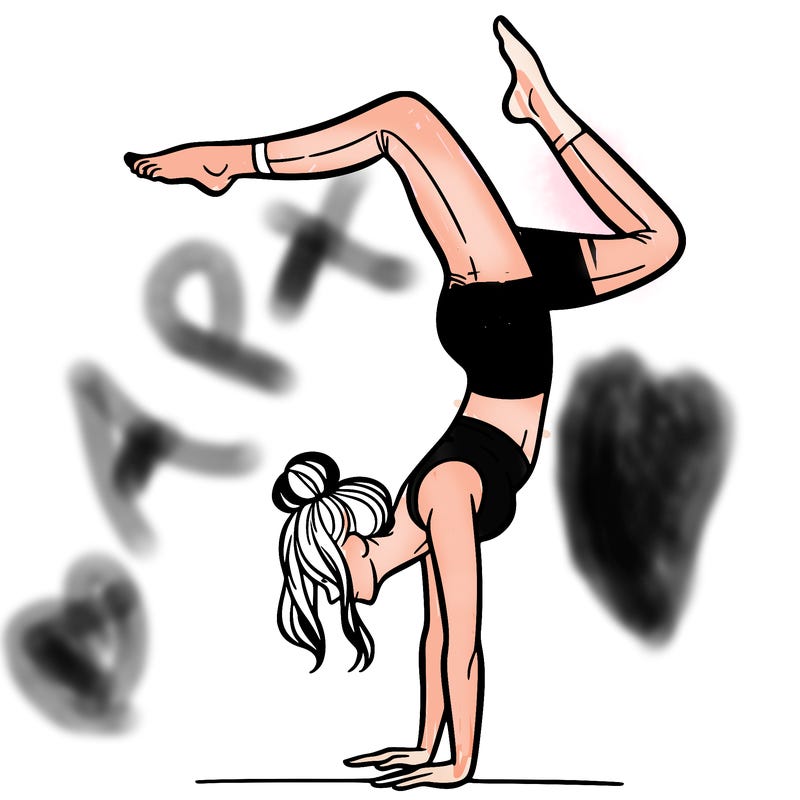 a woman doing a handstand