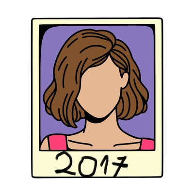 a polaroid portrait of swift's face cut off at the eyes