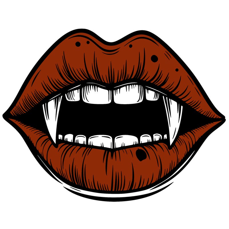 lips with vampire teeth