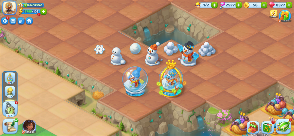 Merge Fables® - Merge Fablesのゲームプレイ画面、パズルグリッド上に異なる雪だるまと冬のアイテムが表示されている