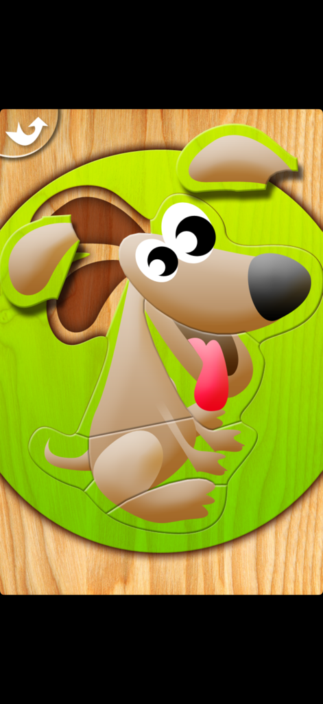 My First Puzzles - Un puzle de perro de dibujos animados con texturas de madera de la aplicación Mis Primeros Puzles para niños pequeños.