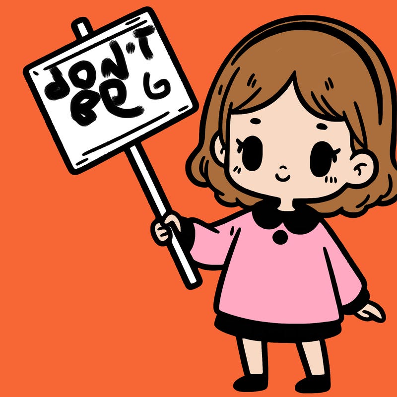 a girl holding a sign