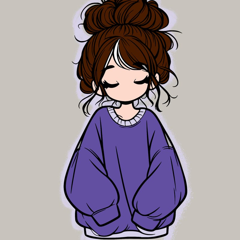 girl with baggy sweatshirt and messy bun