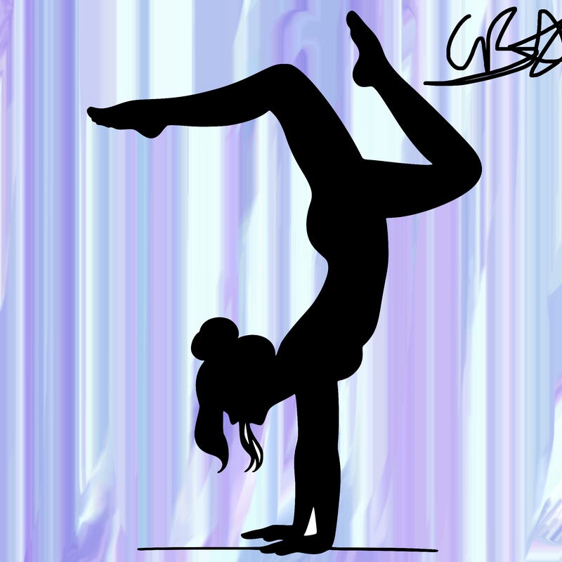 a woman doing a handstand