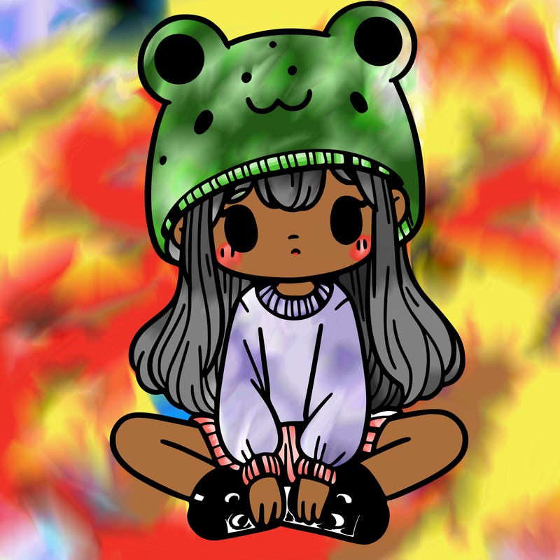 a girl wearing a frog hat and some frog socks