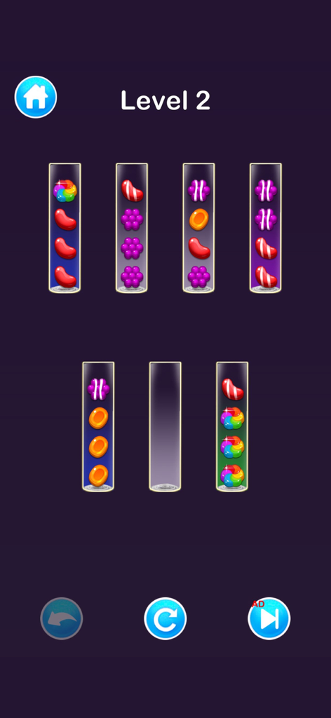 Sort Puzzle & Color Ball Games - Gameplay screenshot of Sort Puzzle and Color Ball Games showing colorful candy pieces inside glass tubes for a sorting challenge on level 2.