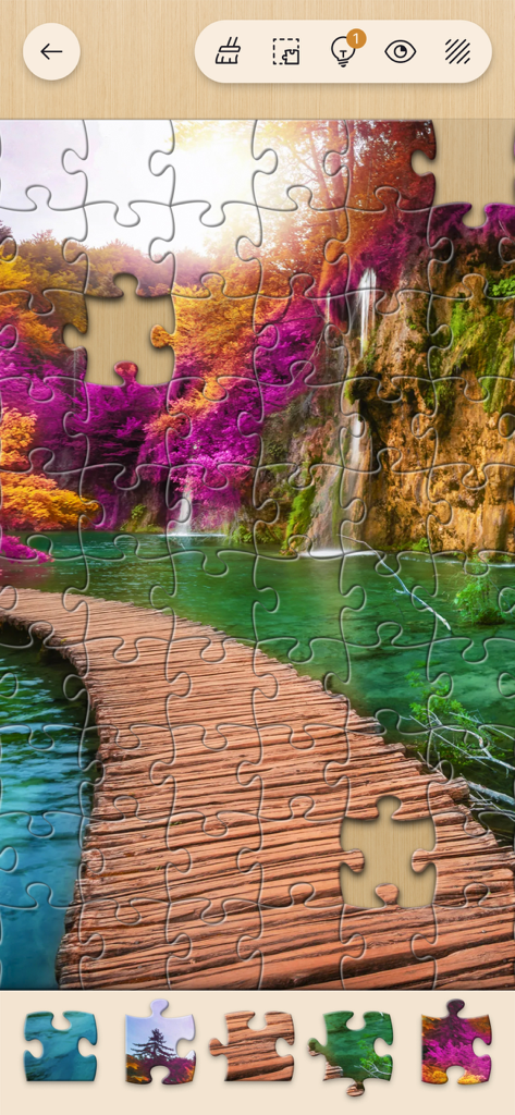 Jigsawscapes® - Jigsaw Puzzles - Un puzzle digitale a incastro di un paesaggio naturale panoramico con un ponte di legno e una cascata.