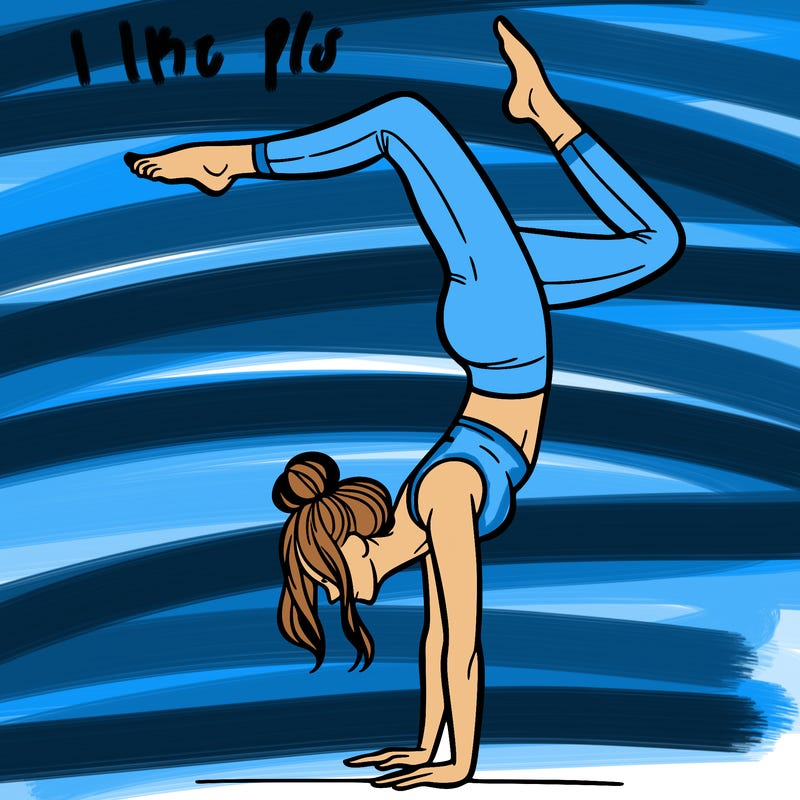 a woman doing a handstand