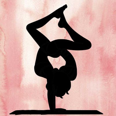 a woman doing a handstand