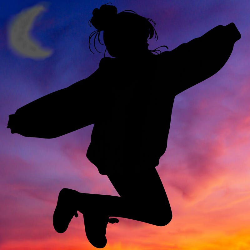 realistic girl jumping with a bun and oversized sweatshirt