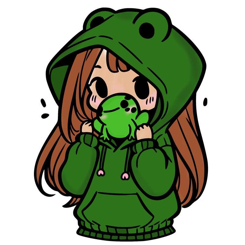 a girl holding a froggy hoodie