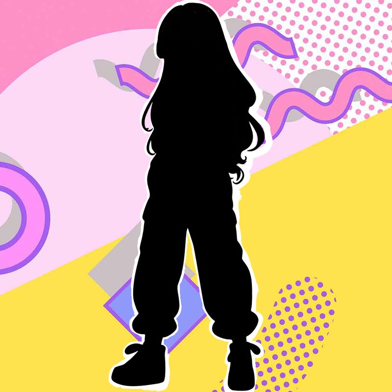 girl in baggy pants crop top and long hair