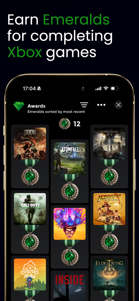 Screen displaying emerald medals for completing Xbox games in Area X app