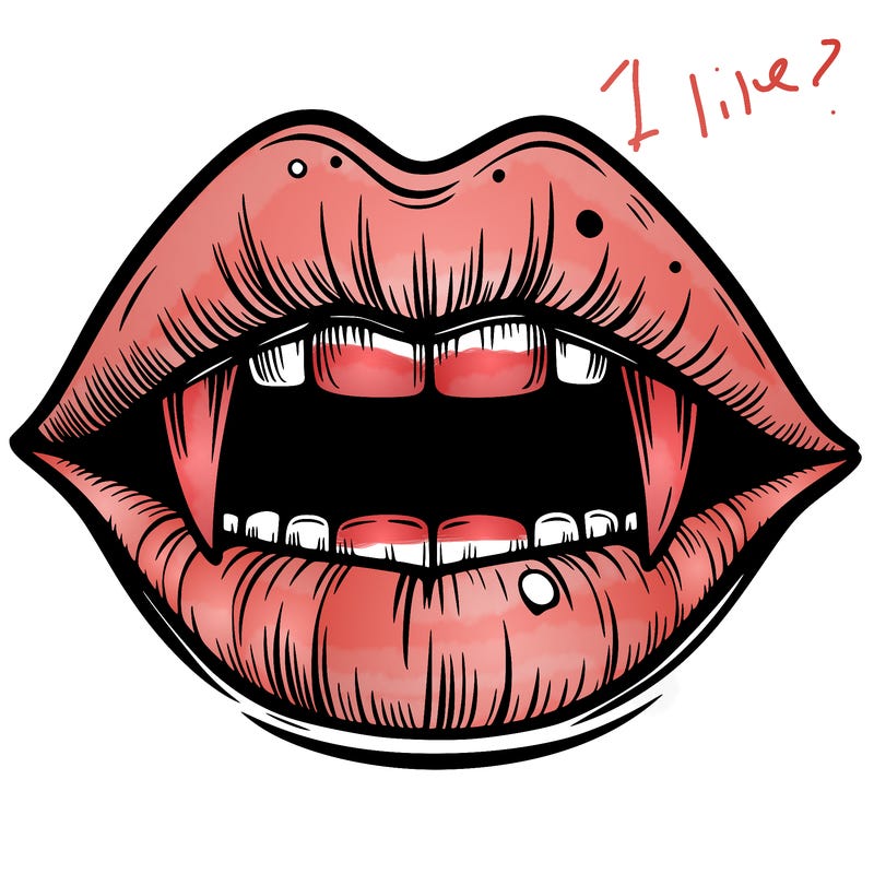 lips with vampire teeth
