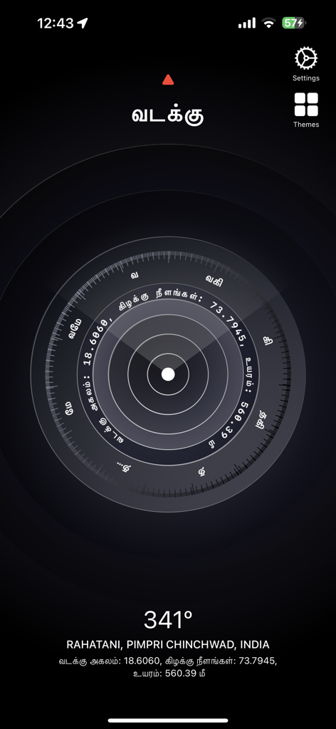 Screenshot of the Tamil Directions Compass mobile app showing a dark-themed navigation interface with Tamil labels, degree measurements, and location coordinates.