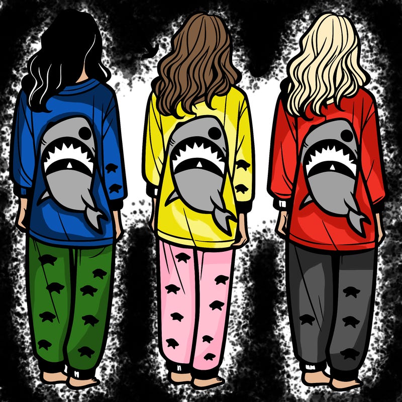 shark themed pajamas on a women