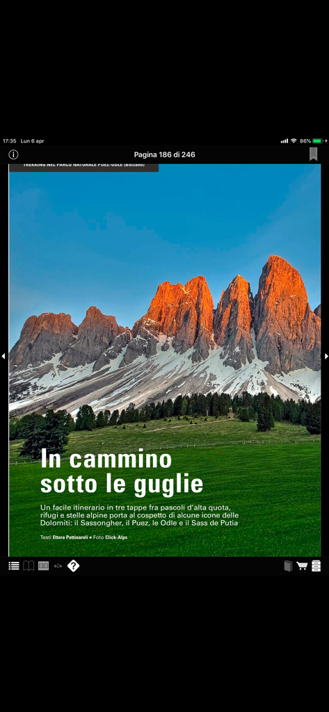 Bell'Italia - A digital magazine page in the Bell Italia app showing the Dolomite mountains at sunset