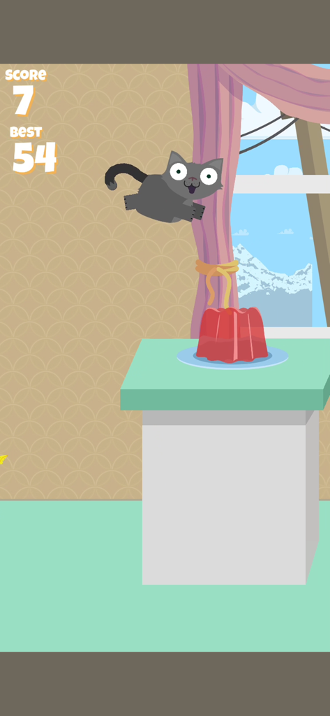 Un chat gris volant dans les airs vers une gelée rouge dans un jeu mobile.