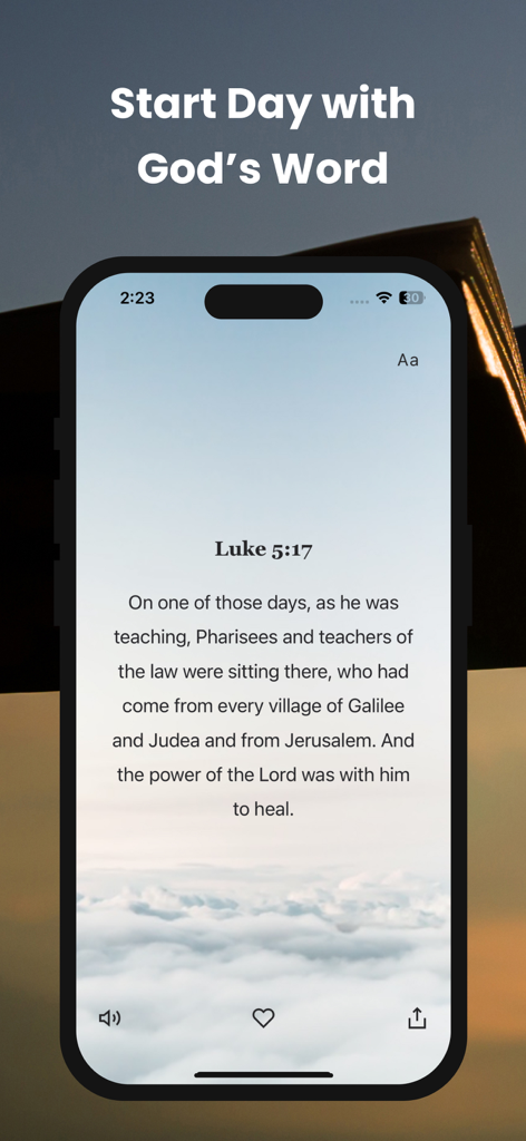 Smartphone displaying a daily Bible verse from the Holy Bible app