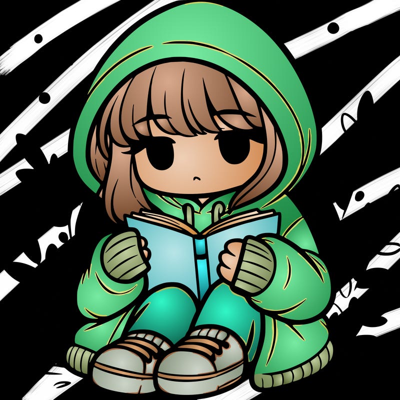 girl in oversized hoodie reading a book