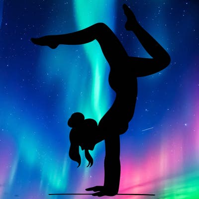 a woman doing a handstand