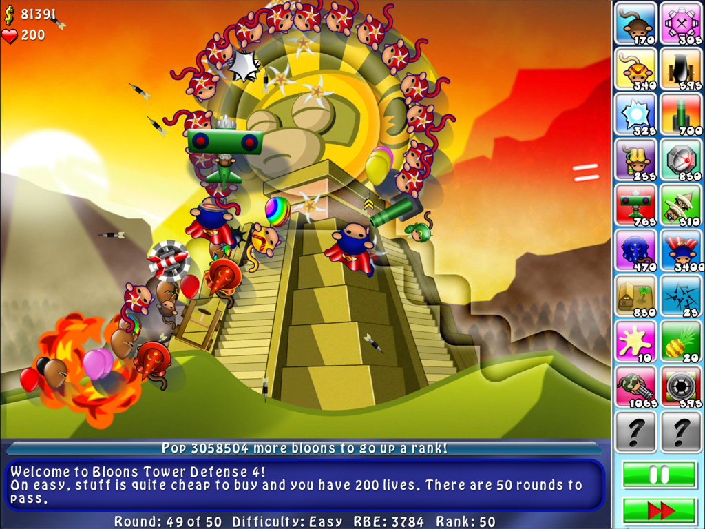 Bloons TD 4 HD gameplay showing monkey towers defending a pyramid track