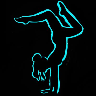 a woman doing a handstand