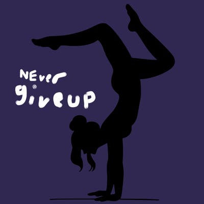 a woman doing a handstand