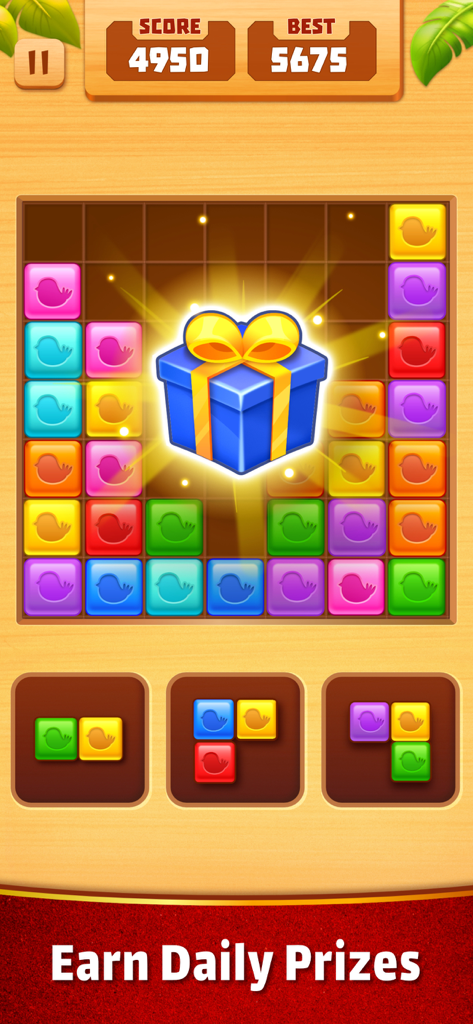 Match Tiles: Block Puzzle Game - Écran de jeu de Match Tiles block puzzle montrant une boîte cadeau lumineuse pour les récompenses quotidiennes et des tuiles d'oiseaux colorées.