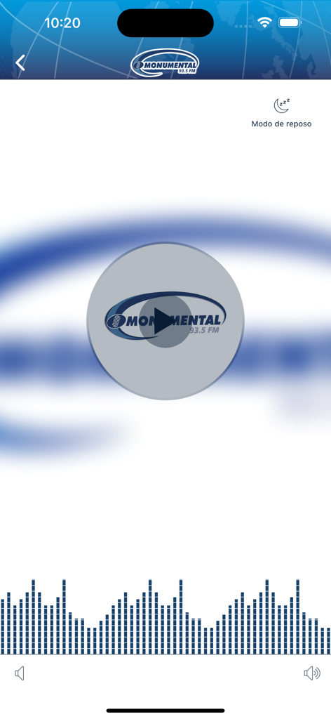 Radio Monumental 93.5 FM app screen showing the live audio player with a play button and wave visualizer