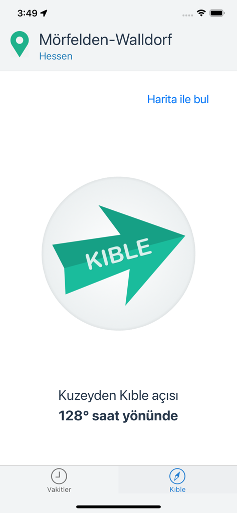 NamazVakti - NamazVakti app screen showing the Qibla compass with a green arrow pointing the direction for prayer