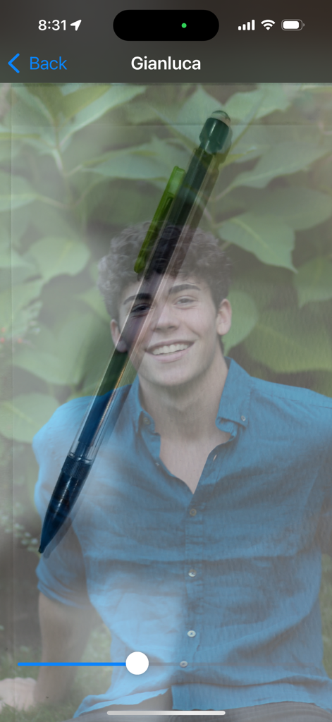 Image Tracer - AR interface showing a transparent portrait photo overlaying a real pencil for drawing