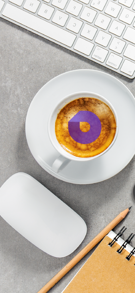 Oreem Delivery - اوريم للتوصيل - Oreem Delivery logo in coffee foam on an office desk with a keyboard and mouse