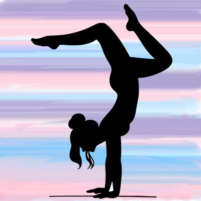 a woman doing a handstand