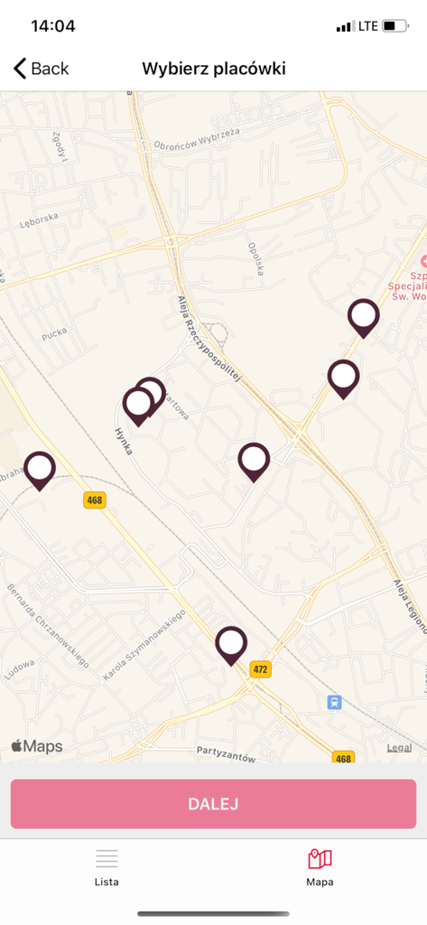 A map interface in the SALTUS Zdrowie mobile app showing multiple medical facility locations with purple pins