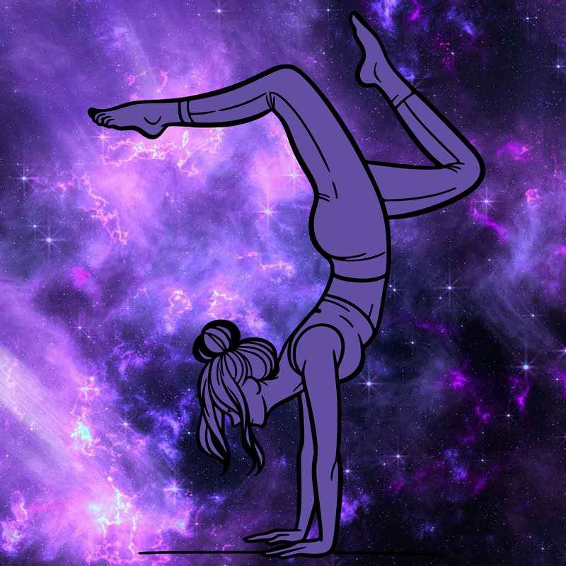 a woman doing a handstand