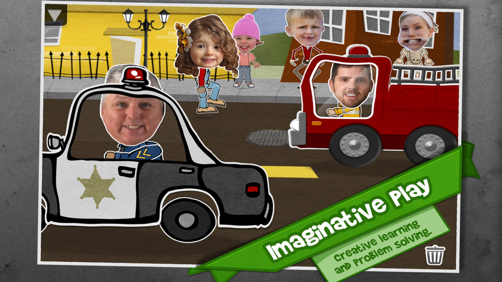 Customizable characters with real human faces in a digital puppet show scene with a police car and fire truck.