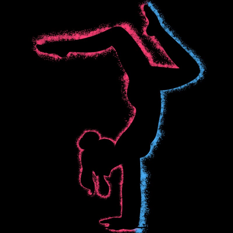 a woman doing a handstand