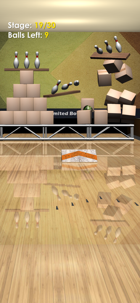 Unlimited Bowling - A screenshot of the Angry Bowl mini game featuring bowling pins on top of cardboard boxes and wooden planks
